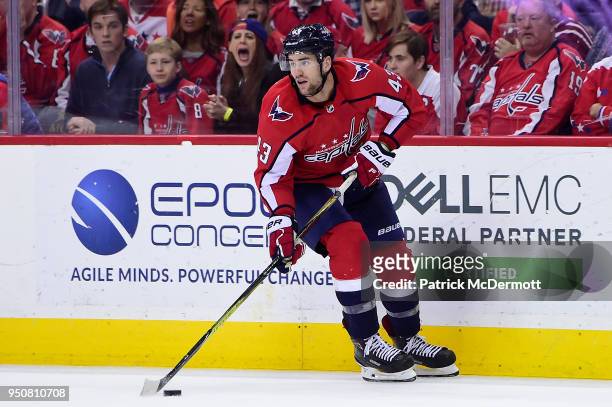 Tom Wilson of the Washington Capitals skates with the puck in the third period against the Columbus Blue Jackets in Game Five of the Eastern...