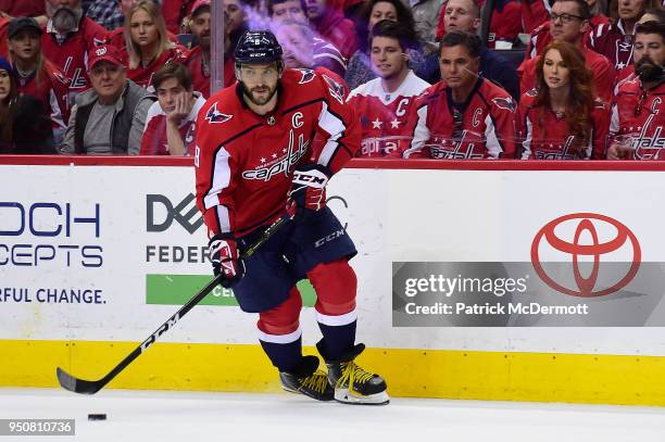 Alex Ovechkin of the Washington Capitals skates with the puck in the third period against the Columbus Blue Jackets in Game Five of the Eastern...