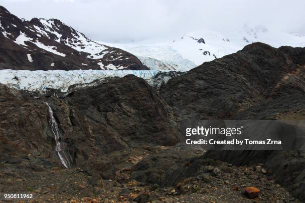 rugged landscape above the túnel glacier - túnel stock-fotos und bilder