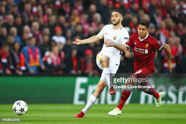 Kostas Manolas of AS Roma clears from Roberto Firmino of Liverpool during the UEFA Champions League Semi Final First Leg match between Liverpool and...