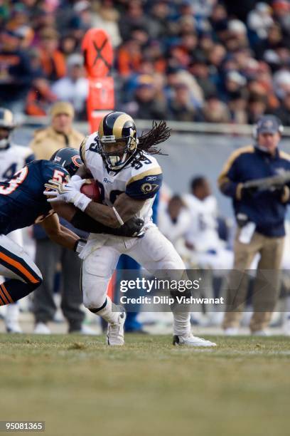 Steven Jackson of the St. Louis Rams rushes against the Chicago Bears at Soldier Field on December 6, 2009 in Chicago, Illinois. The Bears beat the...