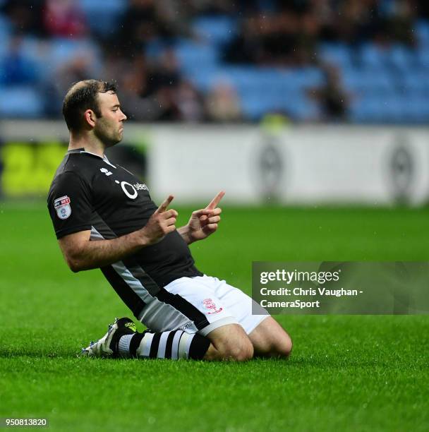 Lincoln City's Matt Rhead celebrates scoring the opening goal during the Sky Bet League Two match between Coventry City and Lincoln City at Ricoh...