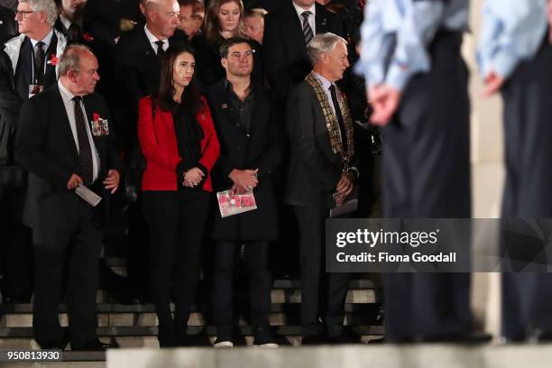 New Zealand Prime Minister Jacinda Ardern (CL and partner Clarke Gayford with Auckland Mayor Phil Goff attend the Anzac Day ceremony at Auckland War...