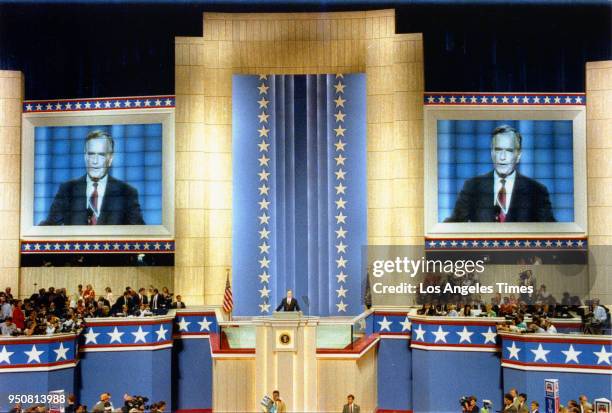 Displayed on duel video screens, President George H. W. Bush gives his acceptance speech at the Republican National Convention in Houston.