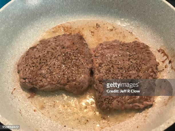 frying minute steak in a frypan with butter - freshness guard stock pictures, royalty-free photos & images