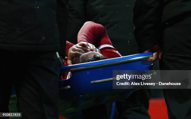 Alex Oxlade-Chamberlain of Liverpool is stretchered off during the UEFA Champions League Semi Final First Leg match between Liverpool and A.S. Roma...