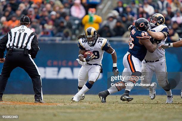 Steven Jackson of the St. Louis Rams rushes against the Chicago Bears at Soldier Field on December 6, 2009 in Chicago, Illinois. The Bears beat the...