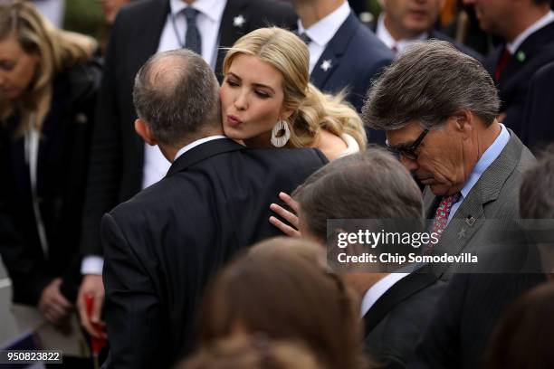 Ivanka Trump kisses Environmental Protection Agency Administrator Scott Pruitt during the state arrival ceremony hosted for French President Emmanuel...