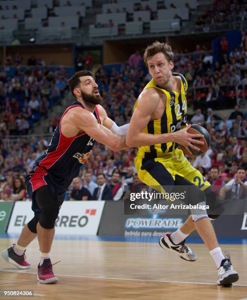 Tornike Shengelia, #23 of Kirolbet Baskonia Vitoria Gasteiz competes with Jan Vesely, #24 of Fenerbahce Dogus Istanbul in action during the Turkish...