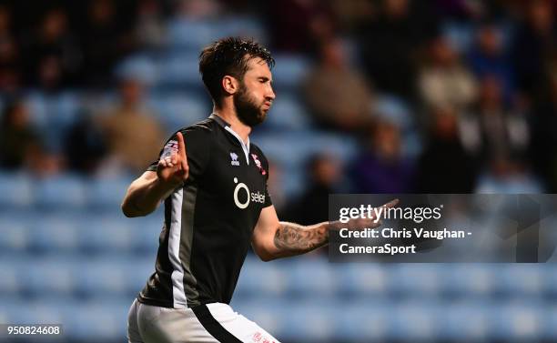 Lincoln City's Ollie Palmer celebrates scoring his sides second goal during the Sky Bet League Two match between Coventry City and Lincoln City at...