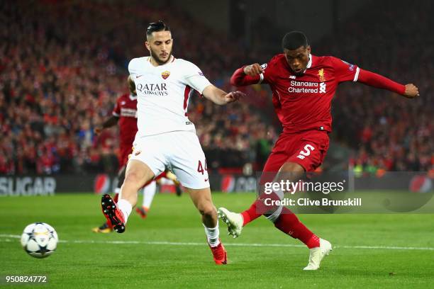 Georginio Wijnaldum of Liverpool shoots past Kostas Manolas of AS Roma during the UEFA Champions League Semi Final First Leg match between Liverpool...