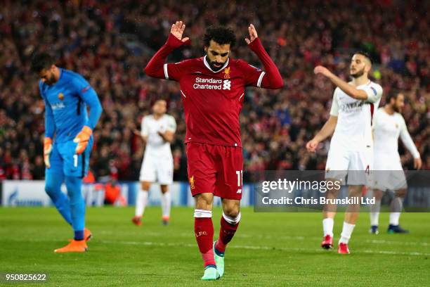 Mohamed Salah of Liverpool celebrates after scoring his sides second goal during the UEFA Champions League Semi Final First Leg match between...