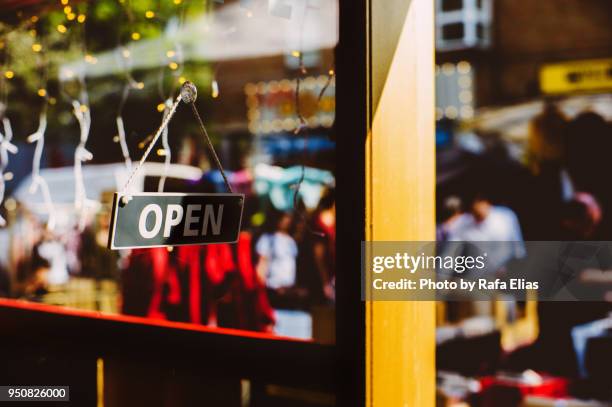 open sign - british culture walking fotografías e imágenes de stock