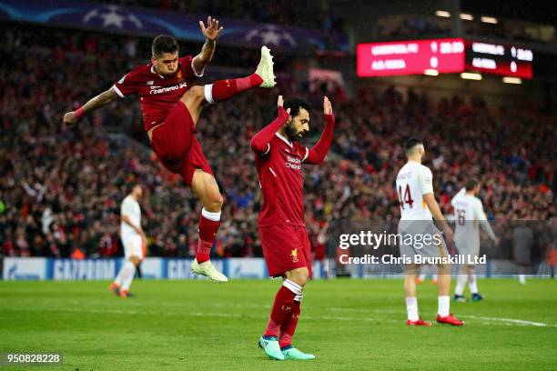 Mohamed Salah of Liverpool and teammate Roberto Firmino celebrate after scoring his sides second goal during the UEFA Champions League Semi Final...