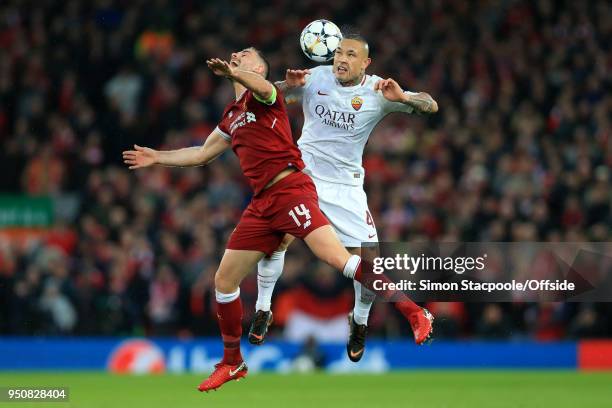 Jordan Henderson of Liverpool battles with Radja Nainggolan of Roma during the UEFA Champions League Semi Final First Leg match between Liverpool and...