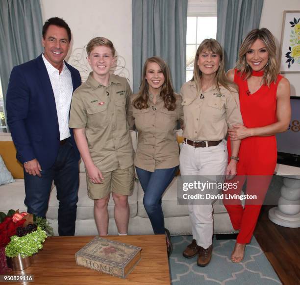 Host Mark Steines, conservationists/TV personalities Robert Irwin, Bindi Irwin and Terri Irwin and TV host Debbie Matenopoulos pose at Hallmark's...