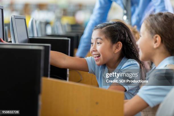 Student Pointing Screen Child Pointing At Screen Photos and Premium High Res Pictures - Getty ...