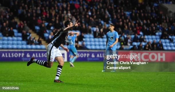 Lincoln City's Ollie Palmer celebrates scoring his sides third goal during the Sky Bet League Two match between Coventry City and Lincoln City at...