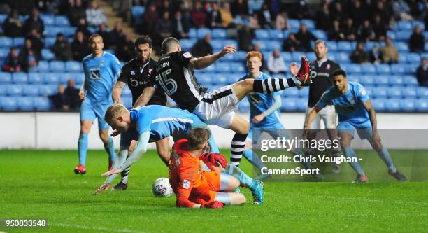 Lincoln City's Ollie Palmer scores his sides third goal during the Sky Bet League Two match between Coventry City and Lincoln City at Ricoh Arena on...