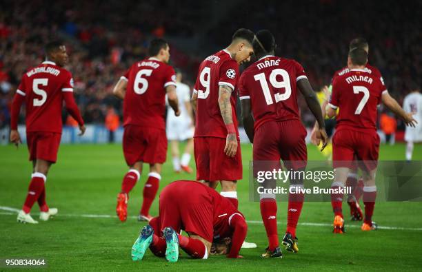 Mohamed Salah of Liverpool celebrates as he scores his sides second goal during the UEFA Champions League Semi Final First Leg match between...