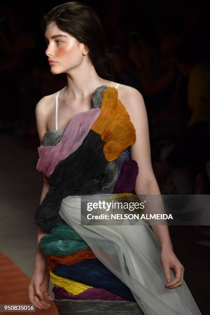 Model presents a creation by designer Fernanda Yamamoto during the Sao Paulo Fashion Week in Sao Paulo, Brazil on April 24, 2018.