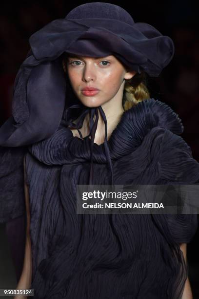 Model presents a creation by designer Fernanda Yamamoto during the Sao Paulo Fashion Week in Sao Paulo, Brazil on April 24, 2018.