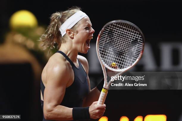 Laura Siegemund of Germany celebrates after winning her match against Barbora Strycova of Czech Republic during day 2 of the Porsche Tennis Grand...