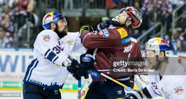 Yannic Seidenberg of Red Bull Muenchen fights with Frank Hoerdler of Eisbaeren Berlin during the DEL Playoff final match 6 between Eisbaeren Berlin...