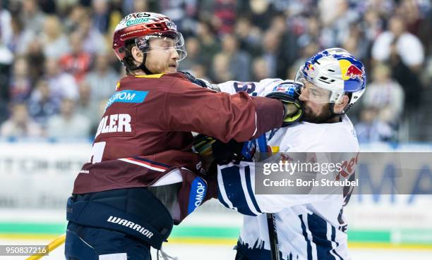 Yannic Seidenberg of Red Bull Muenchen fights with Frank Hoerdler of Eisbaeren Berlin during the DEL Playoff final match 6 between Eisbaeren Berlin...