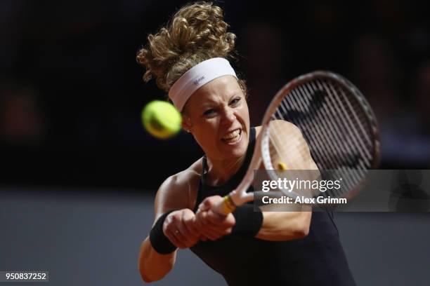 Laura Siegemund of Germany plays a backhand to Barbora Strycova of Czech Republic during day 2 of the Porsche Tennis Grand Prix at Porsche-Arena on...