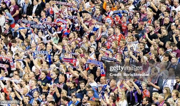 Fans of Eisbaeren Berlin celebrate during the DEL Playoff final match 6 between Eisbaeren Berlin and EHC Red Bull Muenchen at Mercedes-Benz Arena on...