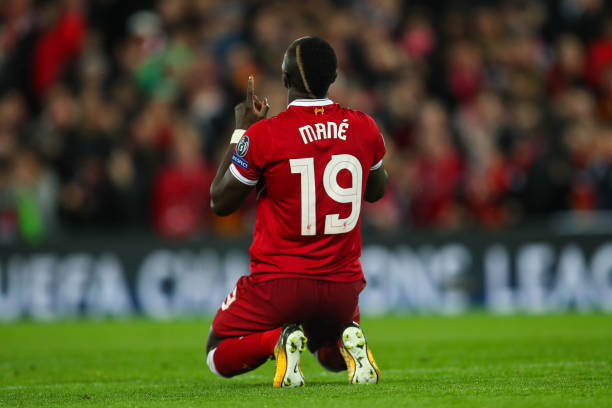 Sadio Mane of Liverpool celebrates after scoring a goal to make it 3-0 during the UEFA Champions League Semi Final First Leg match between Liverpool...