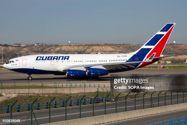 Russian aircraft Ilyushin IL-96-300 with Cubana de Aviación titles taxiing to departure from Madrid Barajas airport.