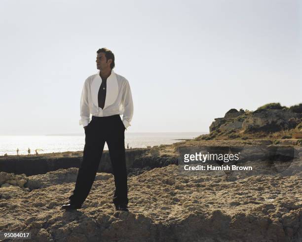 Footballer Luis Figo poses for a portrait shoot in Lisbon, Portugal.