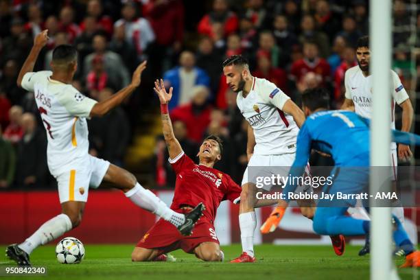 Roberto Firmino of Liverpool and Konstantinos Manolas of AS Roma during the UEFA Champions League Semi Final First Leg match between Liverpool and...