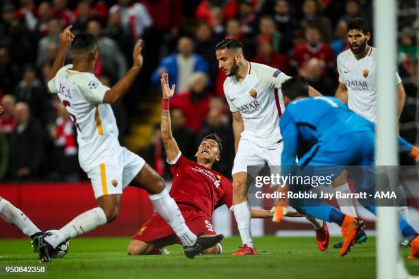 Roberto Firmino of Liverpool and Konstantinos Manolas of AS Roma during the UEFA Champions League Semi Final First Leg match between Liverpool and...