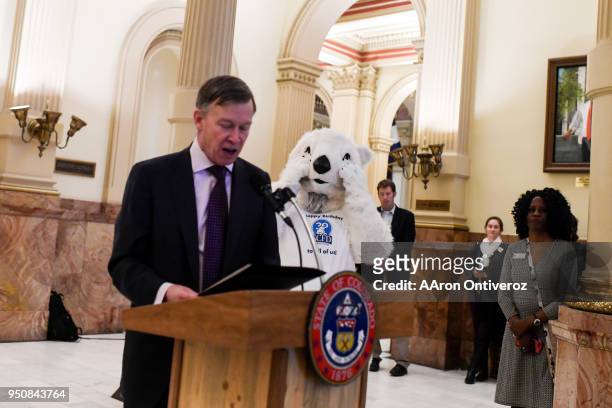 Popsicle the Polar Bear reacts as Colorado Gov. John Hickenlooper proclaims April 24 as the 30-year anniversary for the Scientific & Cultural...