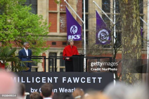 British Prime Minister Theresa May delivers a speech during the official unveiling of a statue in honour of the first female Suffragette Millicent...