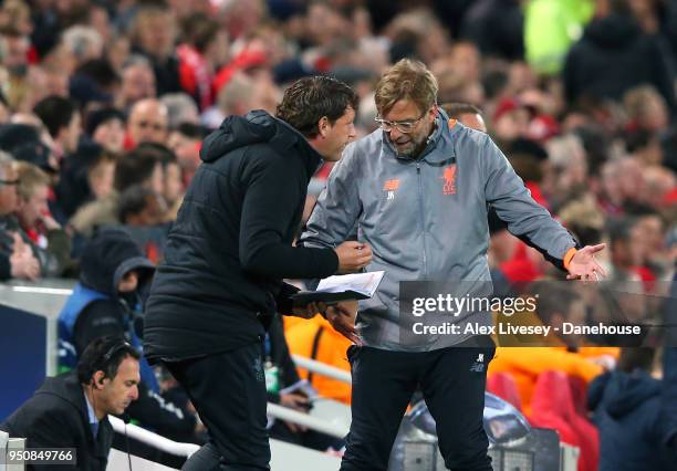 Jurgen Klopp the manager of Liverpool consults his assistant Zeljko Buvac during the UEFA Champions League Semi Final First Leg match between...