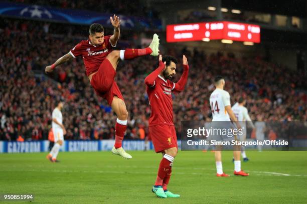 Mohamed Salah of Liverpool celebrates with teammate Roberto Firmino of Liverpool after scoring their 2nd goal during the UEFA Champions League Semi...