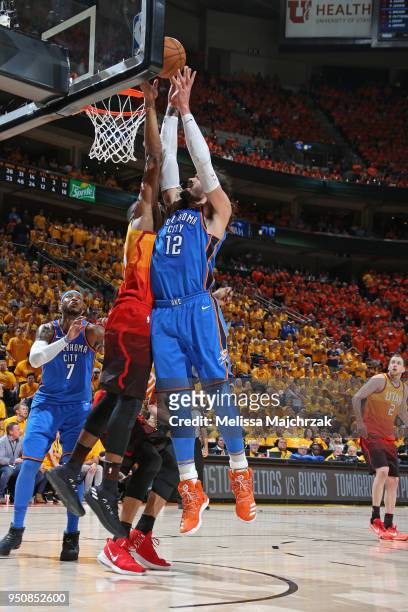Steven Adams of the Oklahoma City Thunder rebounds the ball against the Utah Jazz of Game Three of Round One of the 2018 NBA Playoffs on April 21,...