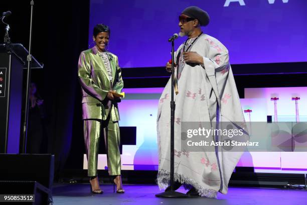 Host Journalist, Edward R. Murrow Award Recipient Tamron Hall and Pioneer and Founding Father of Hip Hop DJ Kool Herc speak on stage during Tribeca...