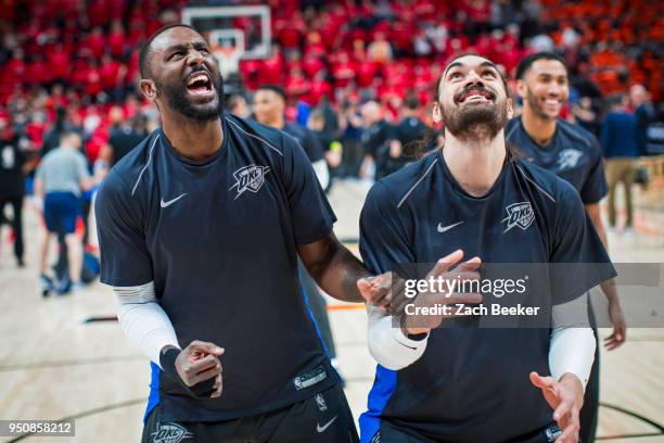 Patrick Patterson and Steven Adams of the Oklahoma City Thunder warm up prior to Game Three of Round One of the 2018 NBA playoffs against the Utah...