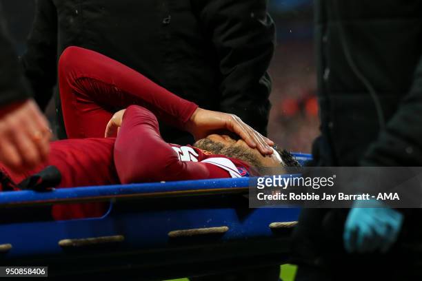 Alex Oxlade-Chamberlain of Liverpool goes off on a stretcher during the UEFA Champions League Semi Final First Leg match between Liverpool and A.S....
