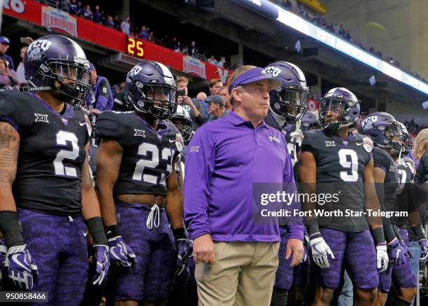 Texas Christian head coach Gary Patterson prepares to lead his team onto the field against Stanford in the Valero Alamo Bowl at the Alamodome in San...