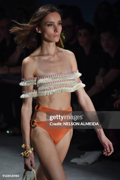 Model presents a creation by Borana during the Sao Paulo Fashion Week in Sao Paulo, Brazil on April 24, 2018.