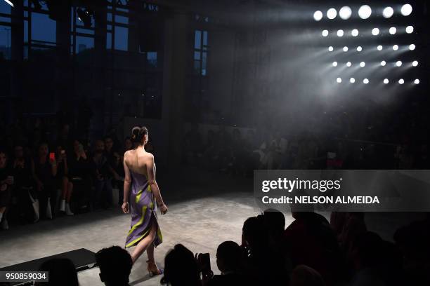 Model presents a creation by Vankoke during the Sao Paulo Fashion Week in Sao Paulo, Brazil on April 24, 2018.