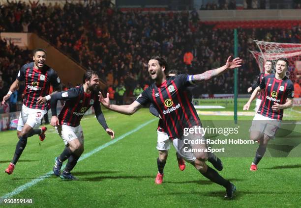 Blackburn Rovers' Charlie Mulgrew celebrates scoring the goal that sees his side promoted during the Sky Bet League One match between Doncaster...