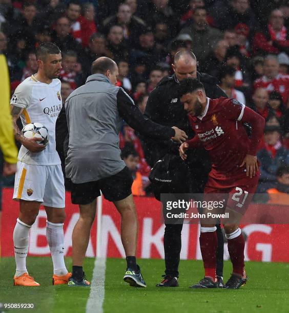 Alex Oxlade-Chamberlain of Liverpool injured during the UEFA Champions League Semi Final First Leg match between Liverpool and A.S. Roma at Anfield...