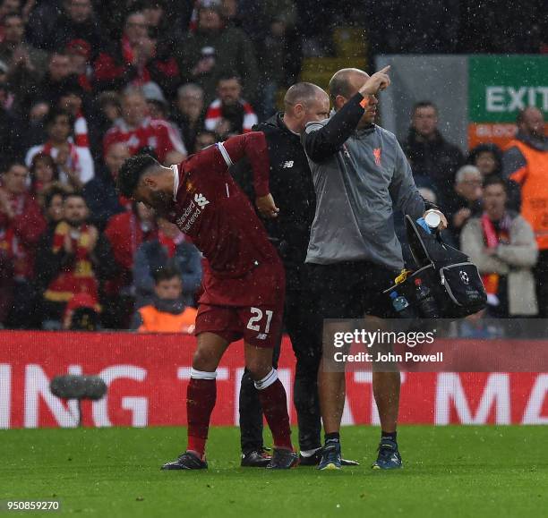 Alex Oxlade-Chamberlain of Liverpool injured during the UEFA Champions League Semi Final First Leg match between Liverpool and A.S. Roma at Anfield...